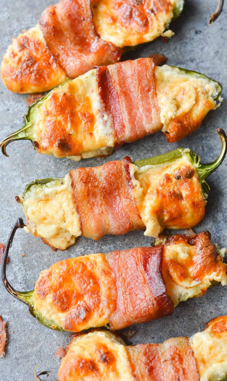 These Bacon Wrapped BBQ Jalapeno Poppers are an incredibly savory, flavorful low carb dish. Perfect to bring to any backyard BBQ, or to just enjoy at home! | heyketomama.com