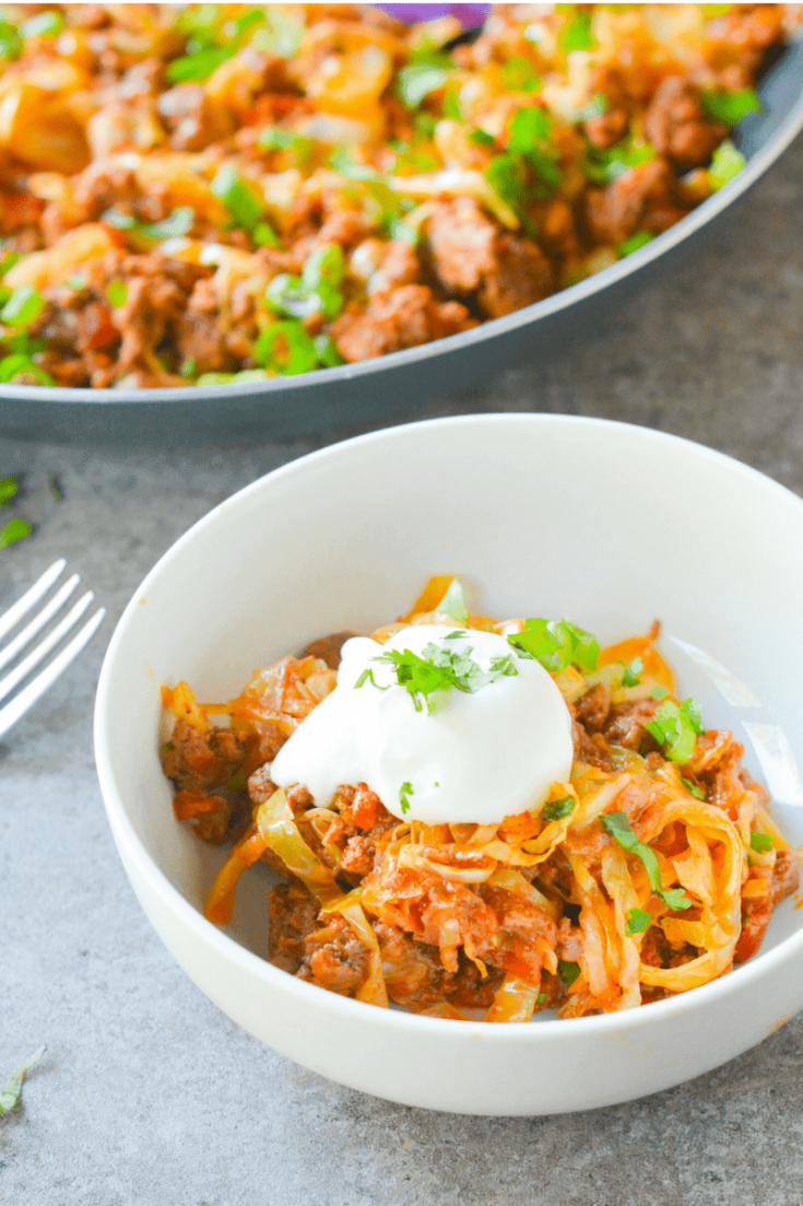 This Low Carb Taco Cabbage Skillet is an easy keto dinner with amazing taco flavor. The perfect one-pan meal for when you're low on time! | heyketomama.com